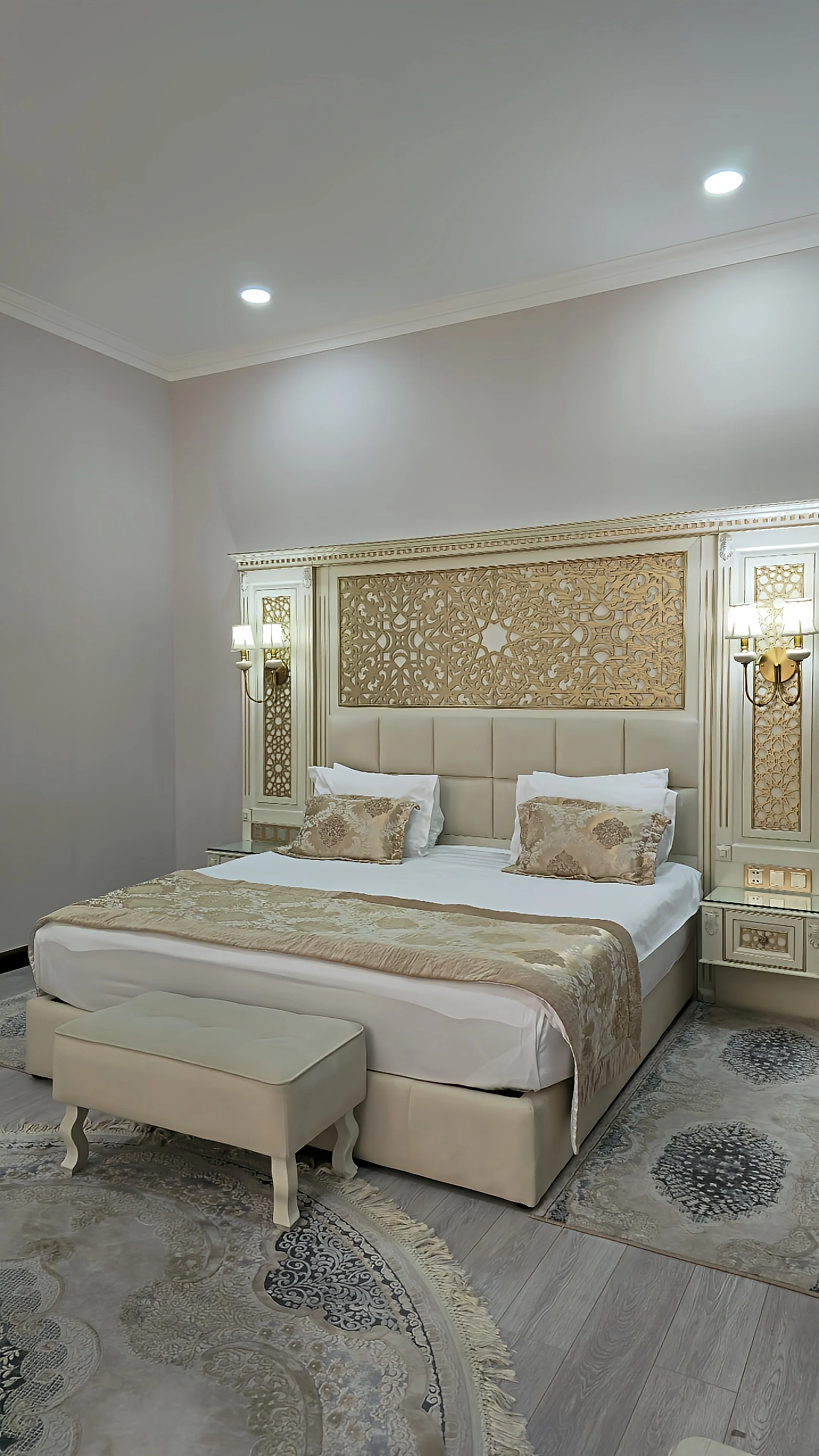 Elegant guest room featuring ornate Uzbek-inspired details and sophisticated furnishings at Dilimah Premium Luxury Hotel