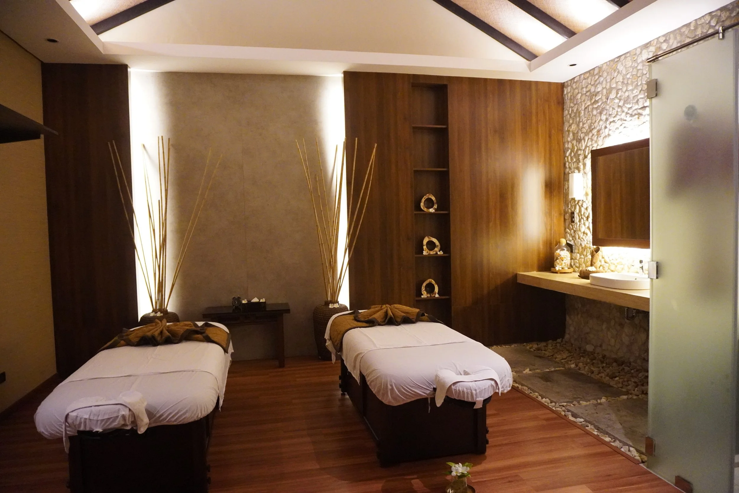 Luxury spa treatment room designed for relaxing wellness experiences in a tropical setting