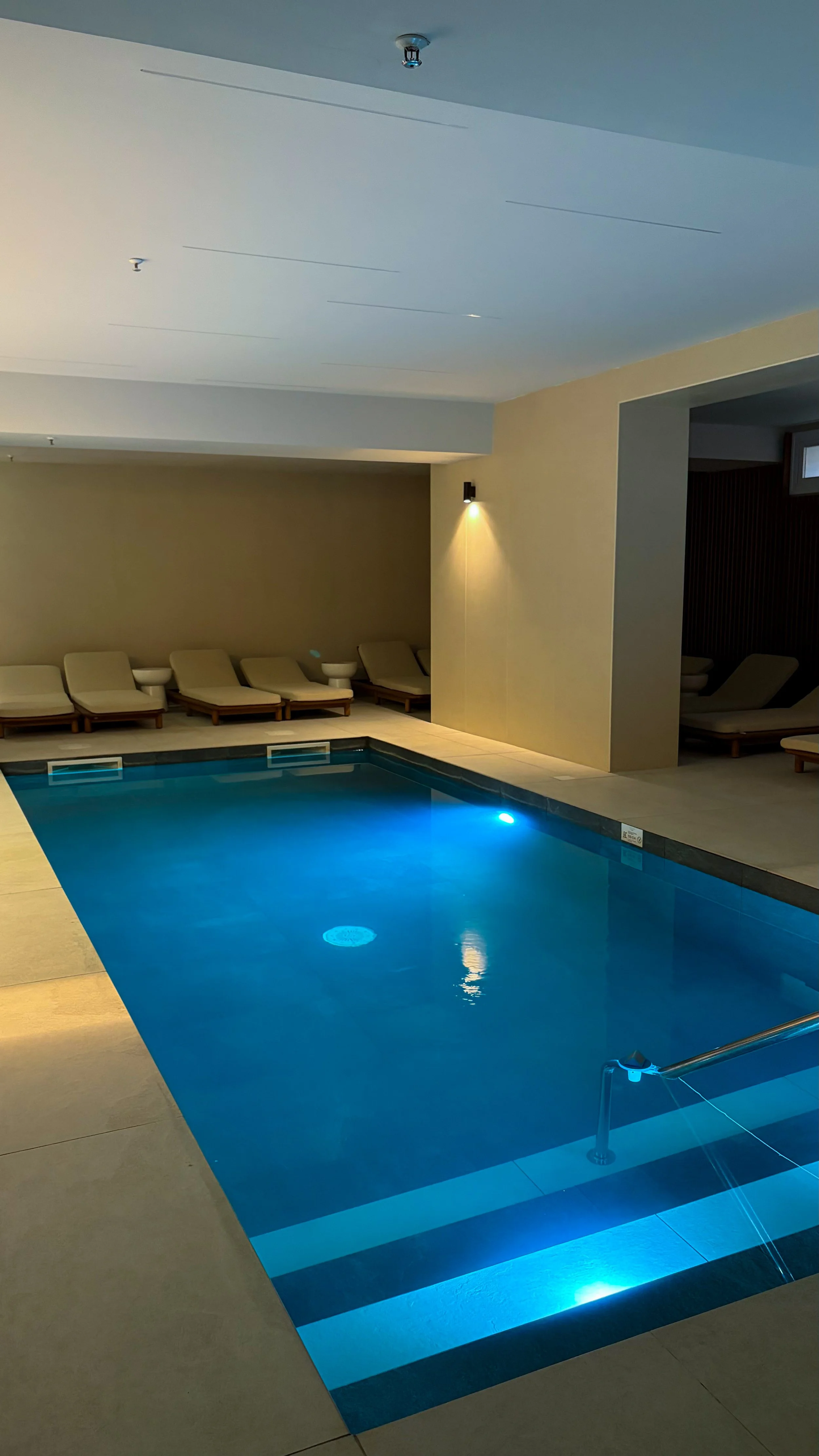 Indoor wellness pool offering a tranquil spa experience throughout the year