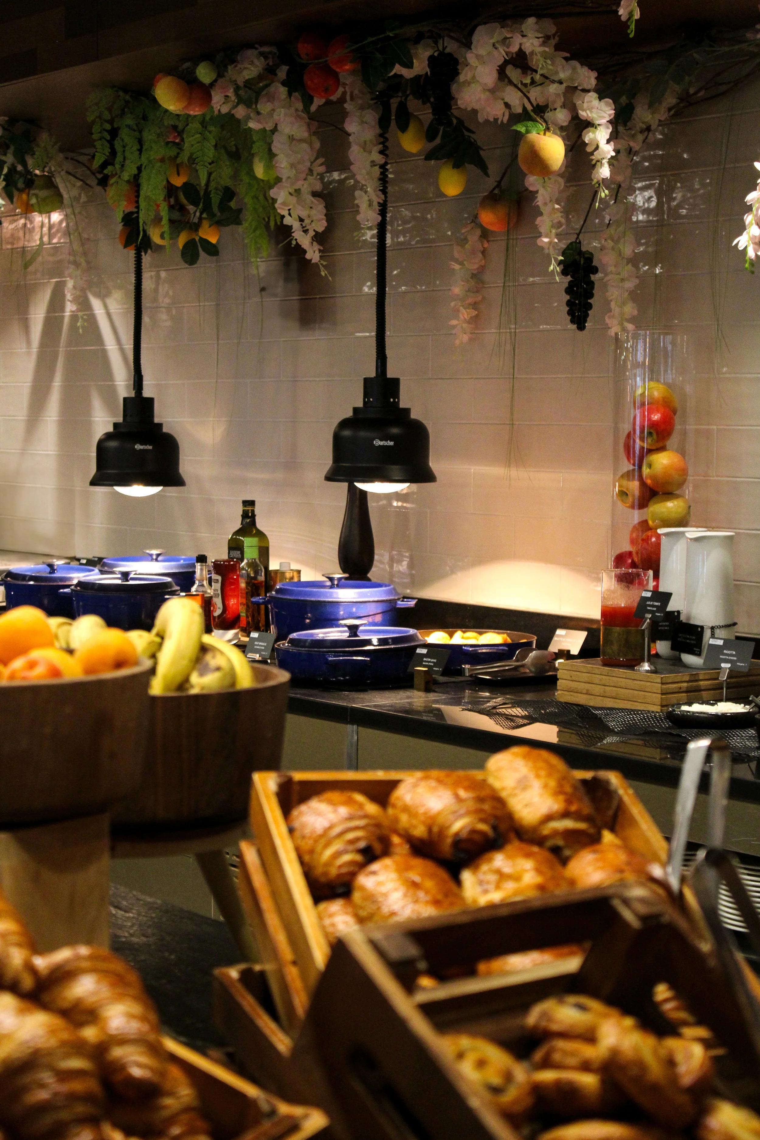 Fresh breakfast buffet featuring pastries, fruit and hot selections