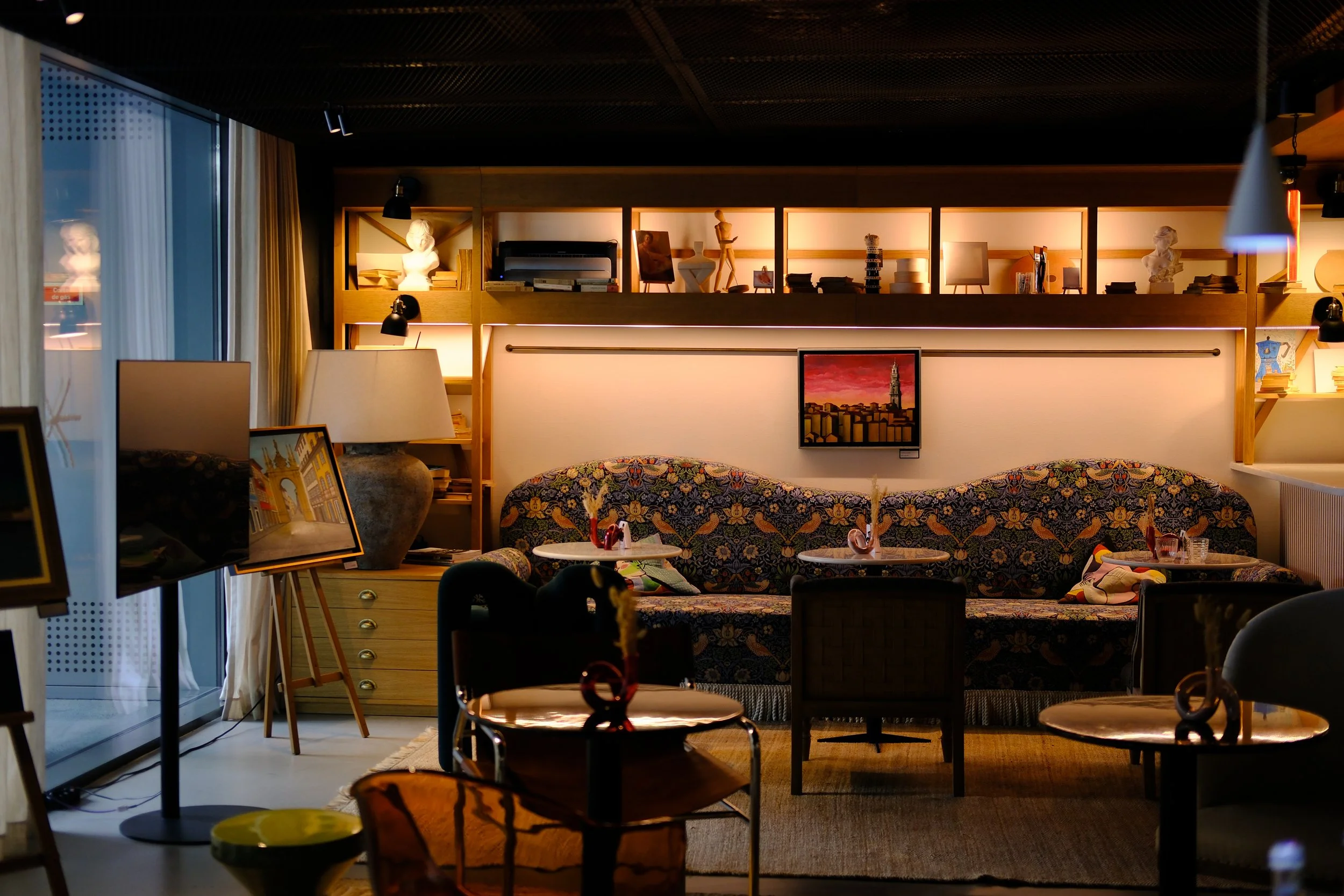 Contemporary lounge blending local artwork, curated décor, and inviting social spaces