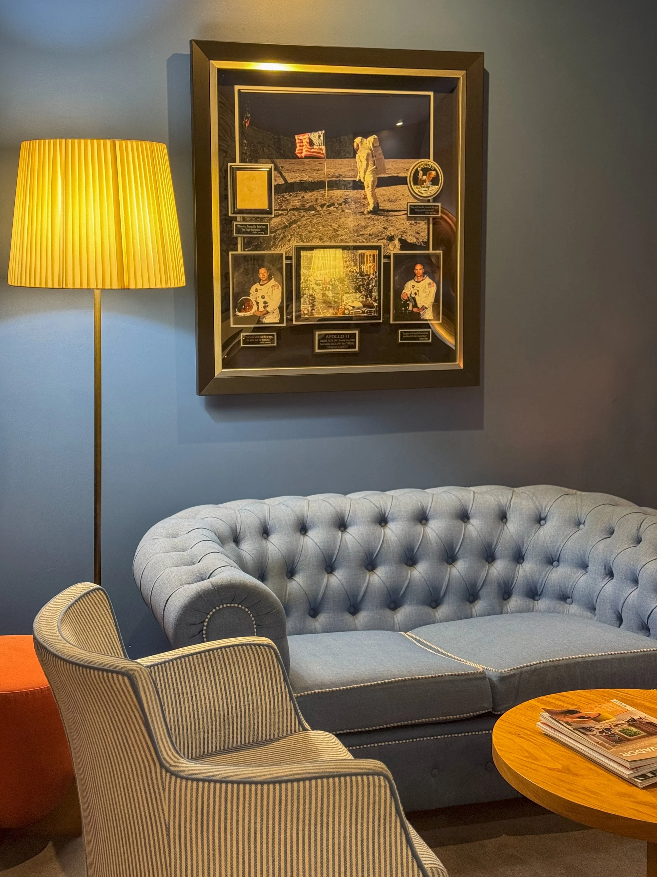Elegant lounge featuring classic furnishings, curated artwork, and sophisticated boutique interiors