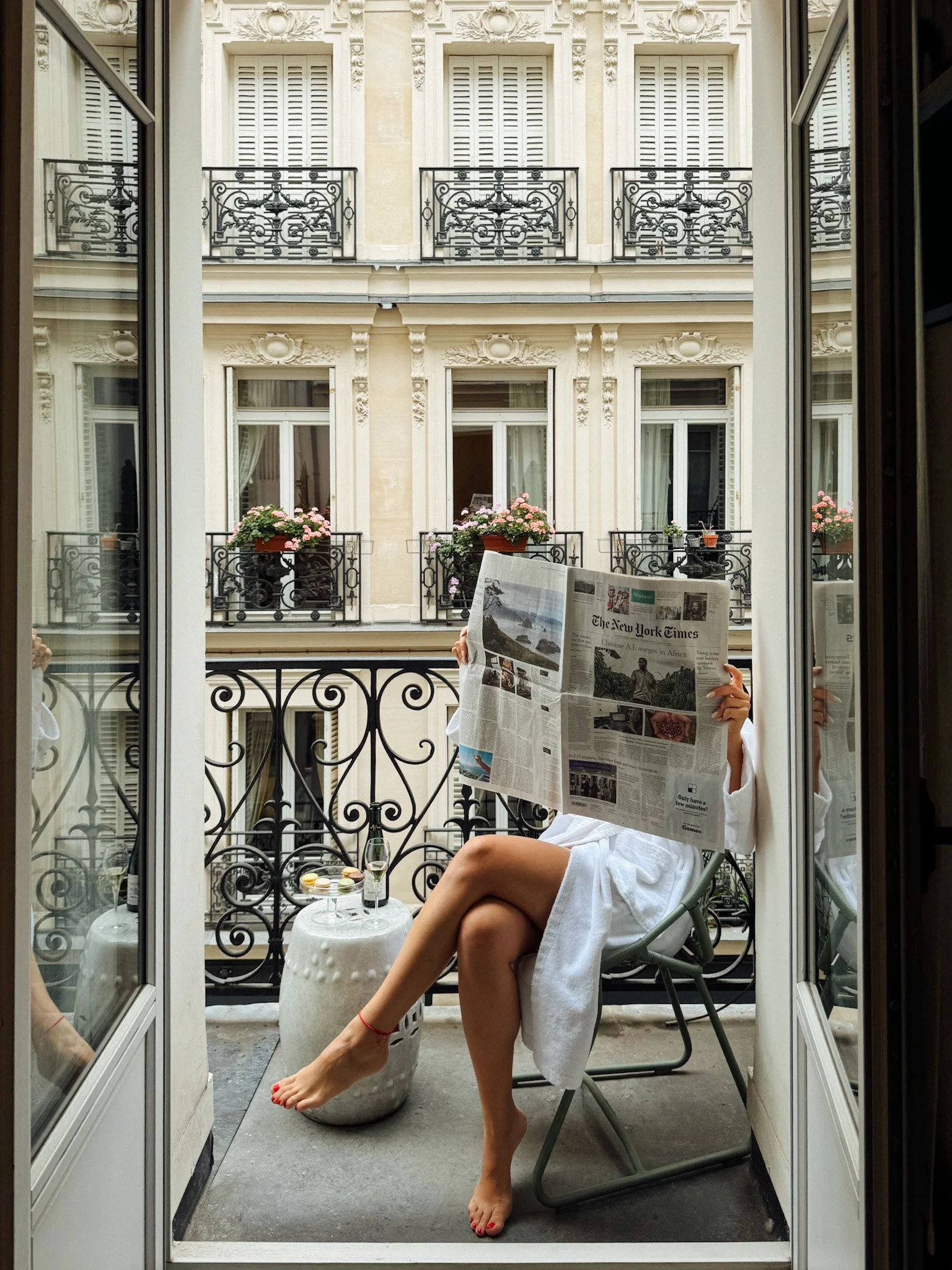 Private Parisian balcony with morning coffee, champagne, and charming courtyard views