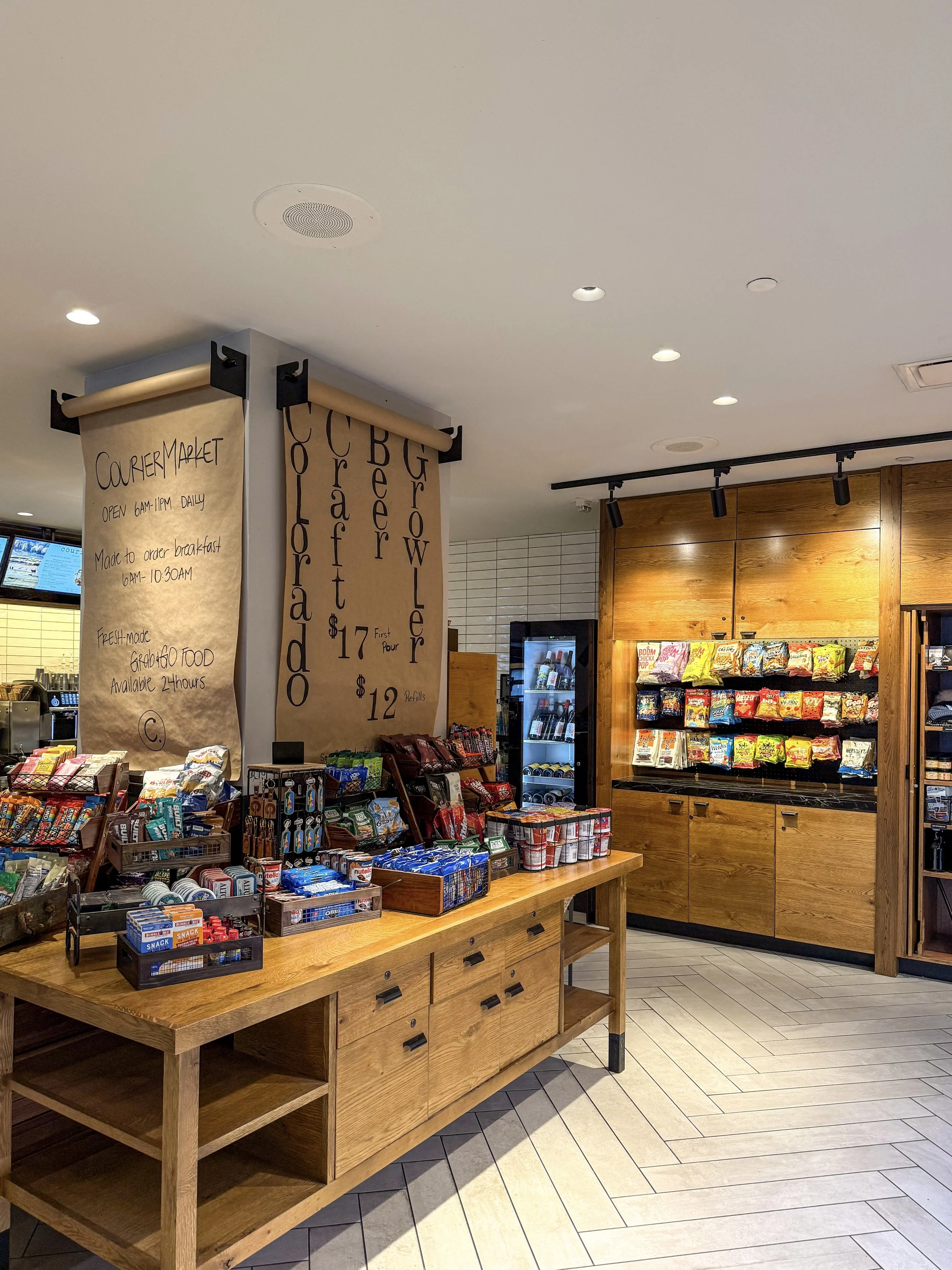 Hotel market offering snacks, drinks, coffee, and made-to-order breakfast options