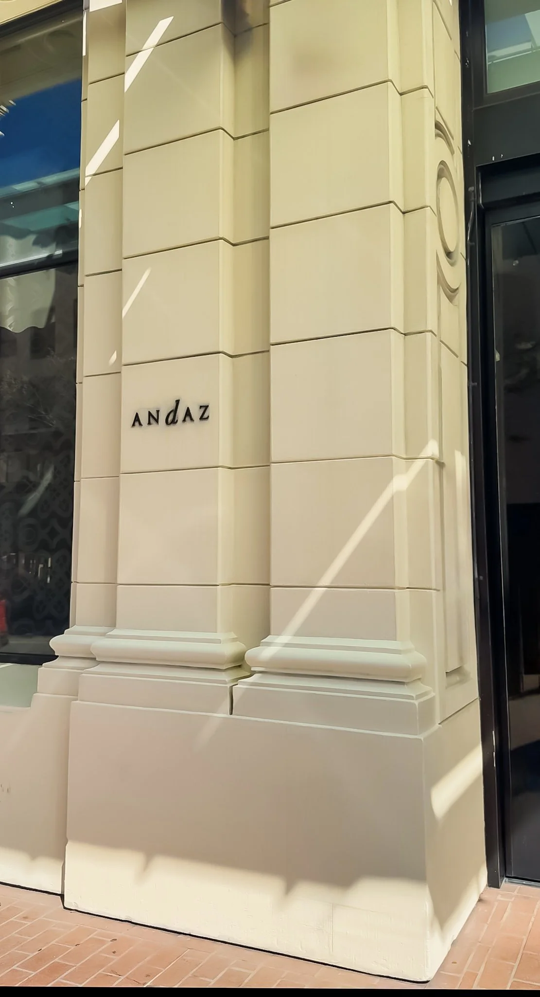 Exterior detail of the hotel façade with Andaz signage and clean architectural lines, Andaz San Diego – San Diego, California.
