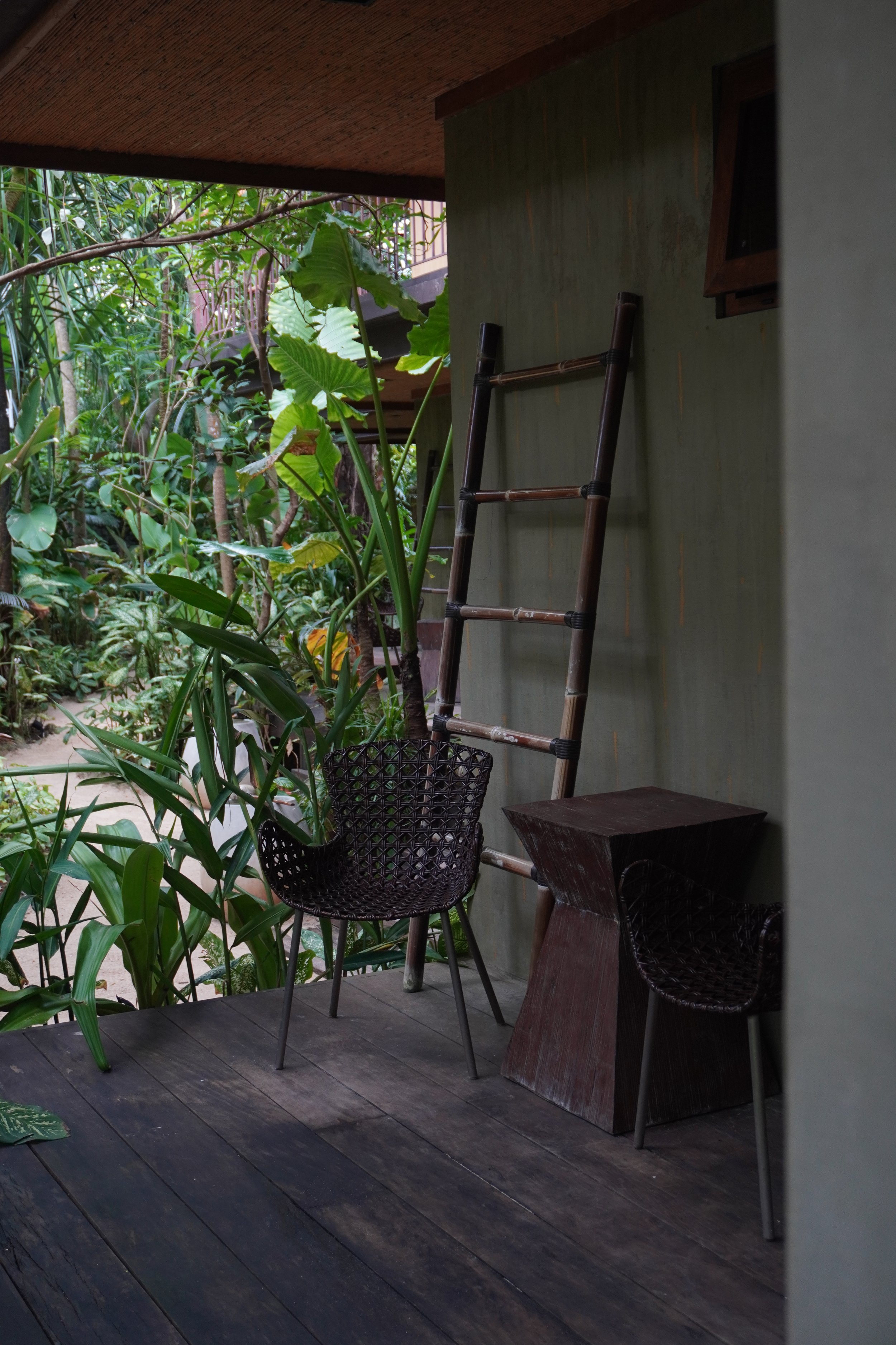 Private terrace surrounded by tropical greenery for quiet relaxation