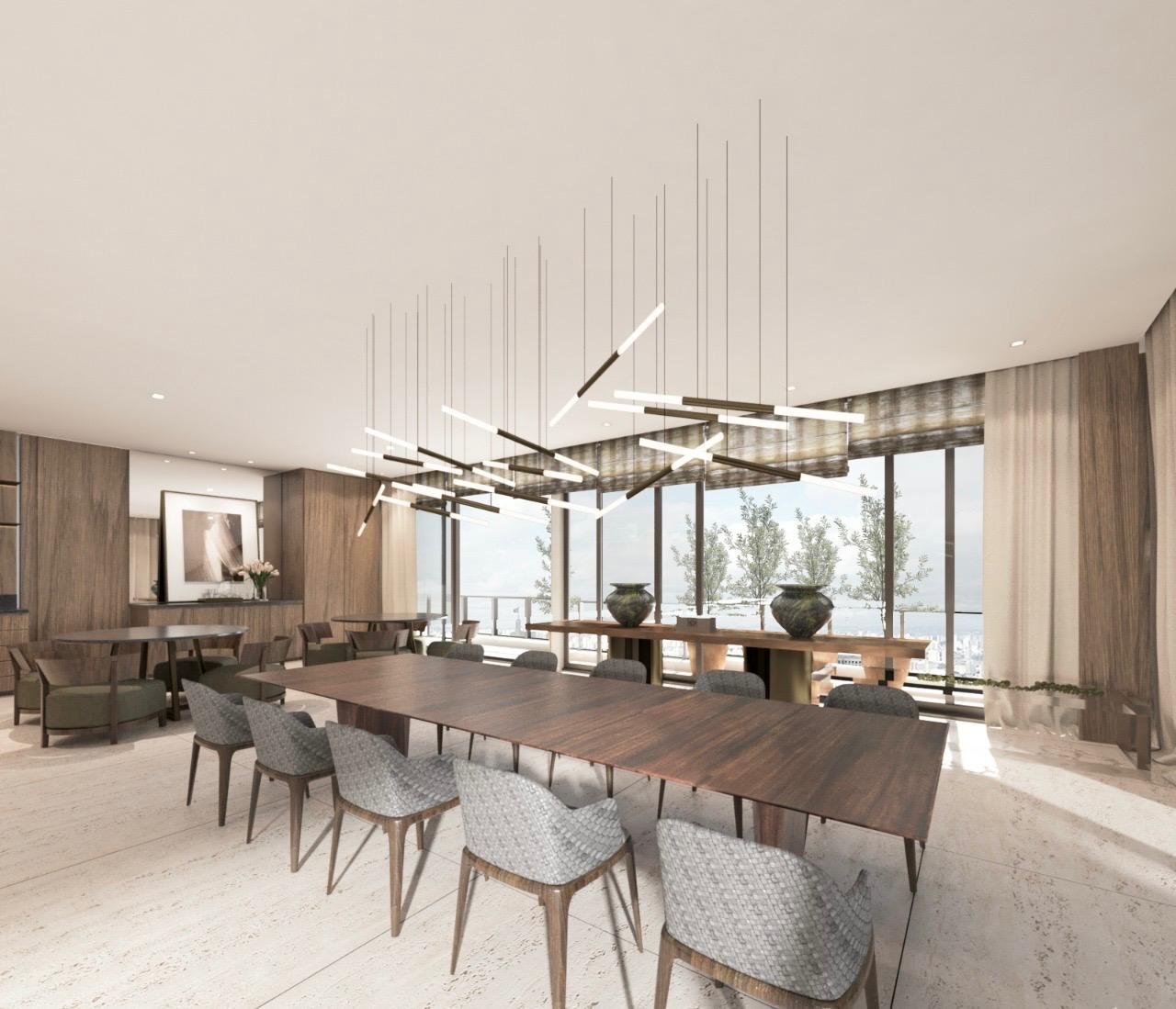 Zona dining: tavolo centrale imponente, con lampadario moderno.