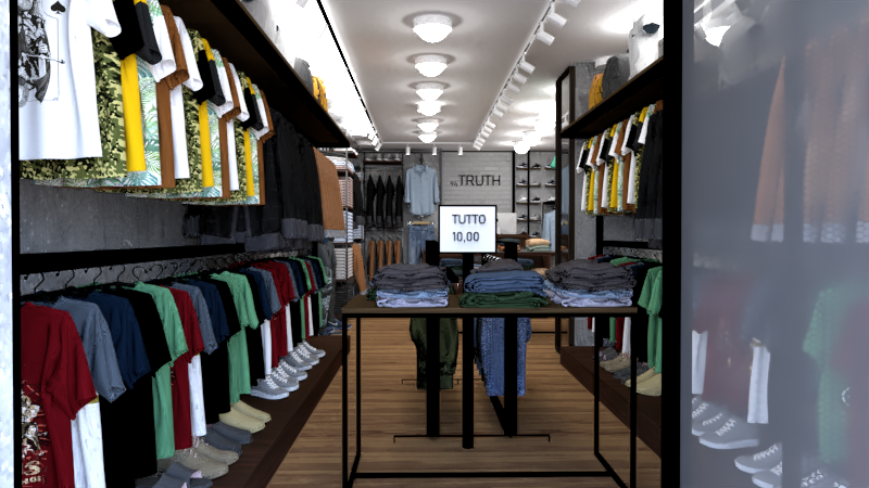 Tra texture materiche e linee essenziali, lo store unisce cemento e mattone grigio a vista con un’illuminazione a binari bianchi precisa e moderna. 