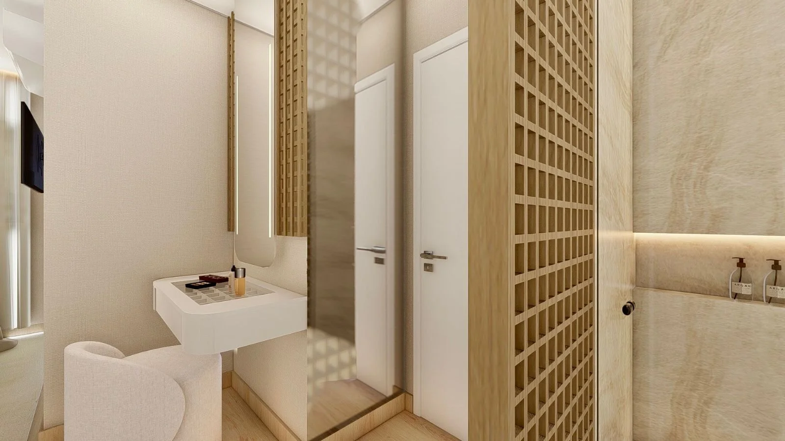Zona beauty della suite con toeletta sospesa, seduta imbottita e specchio verticale illuminato. Il design compatto sfrutta lo spazio creando una postazione elegante e funzionale.