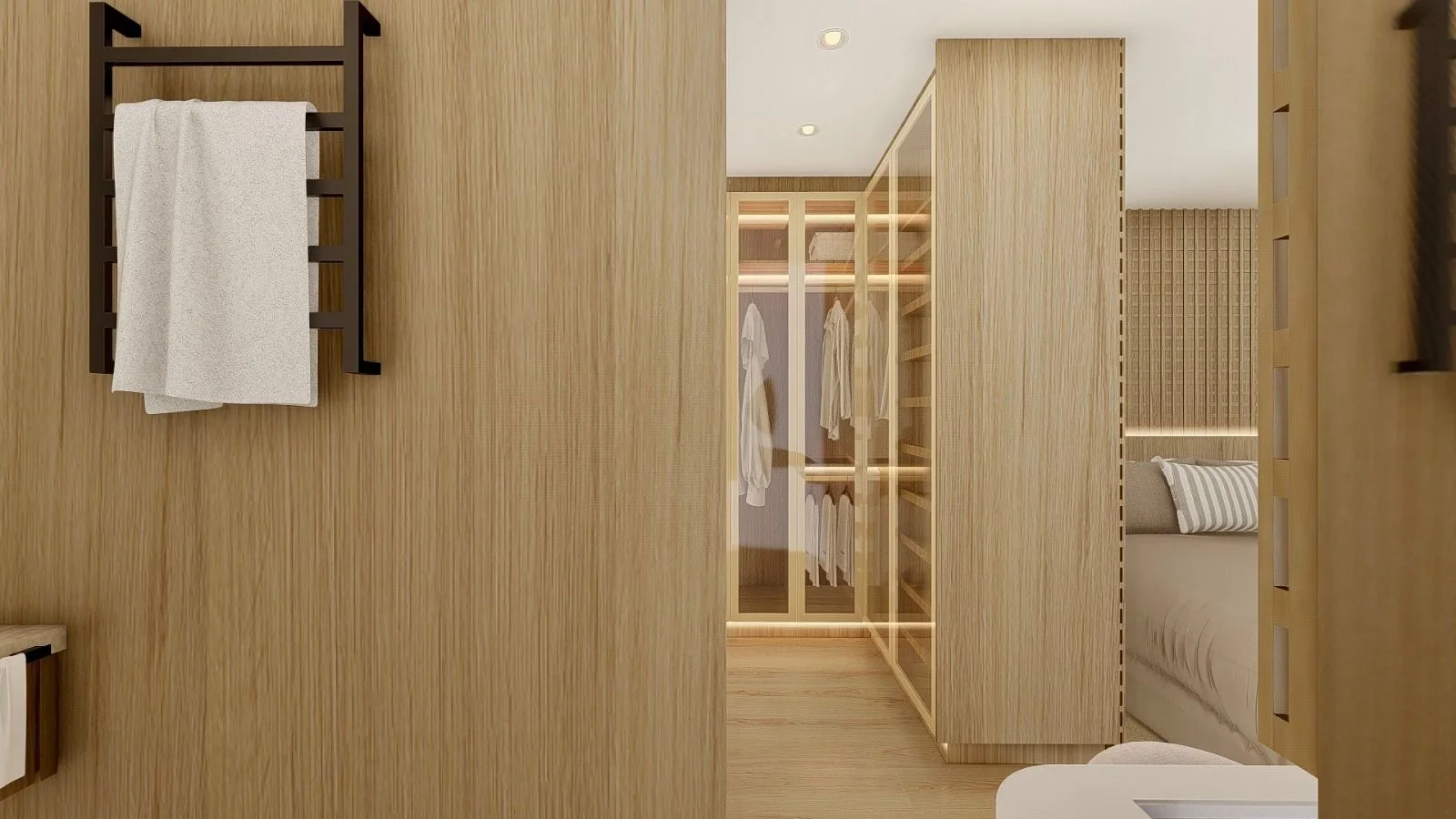 Vista dal bagno verso la cabina armadio e la camera. I rivestimenti continui in legno accompagnano il percorso e collegano visivamente gli ambienti della suite.