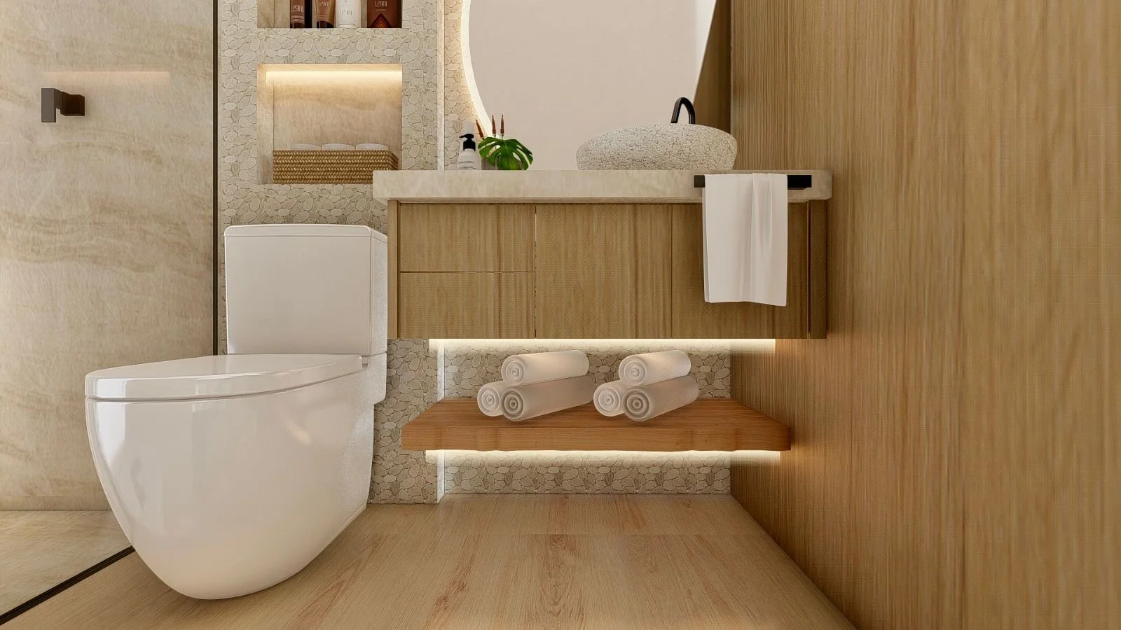 Mobile bagno sospeso in legno con piano chiaro e lavabo da appoggio, completato da mensola inferiore illuminata. Le superfici naturali e la luce indiretta conferiscono leggerezza alla composizione.