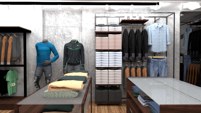 Esposizione abbigliamento dal carattere industriale, con parete in cemento.