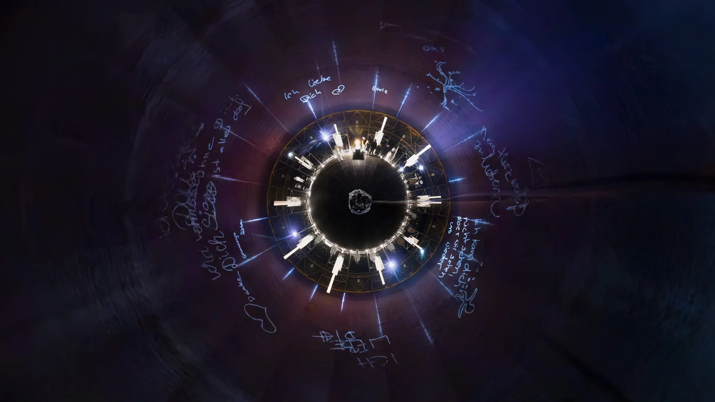 360° projection inside a gasometer filled with handwritten audience messages forming a collective visual layer.