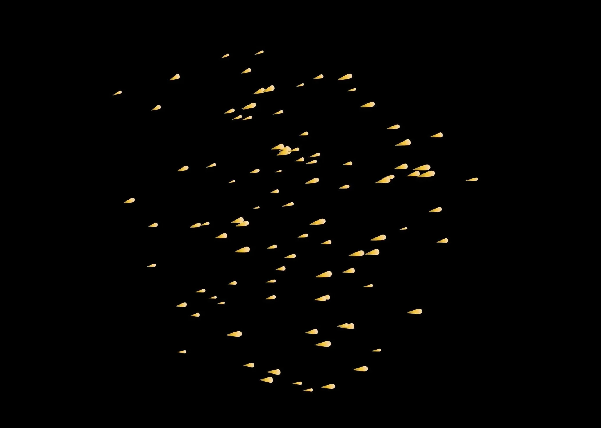 A cluster of small, elongated yellow objects with rounded ends scattered across black background. Abstract yellow little fish move freely in space and unite in a big swarm.