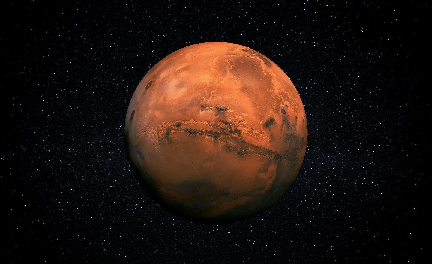 Image of Mars, a reddish planet, floating in space filled with stars.