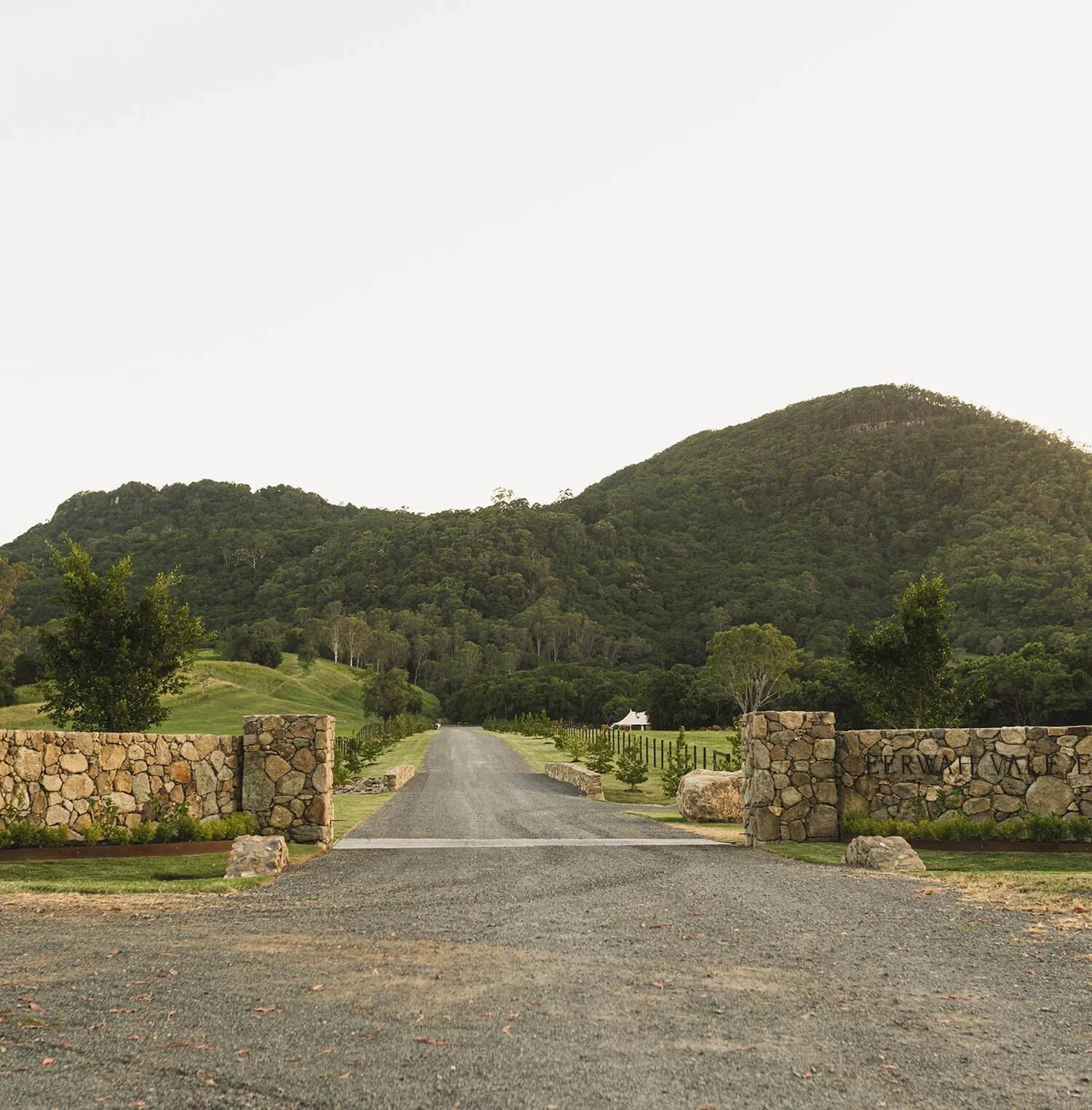 The stone entrance at Eerwah Vale Estate, Noosa Hinterland Wedding Venue, photographed by Ash & Stone