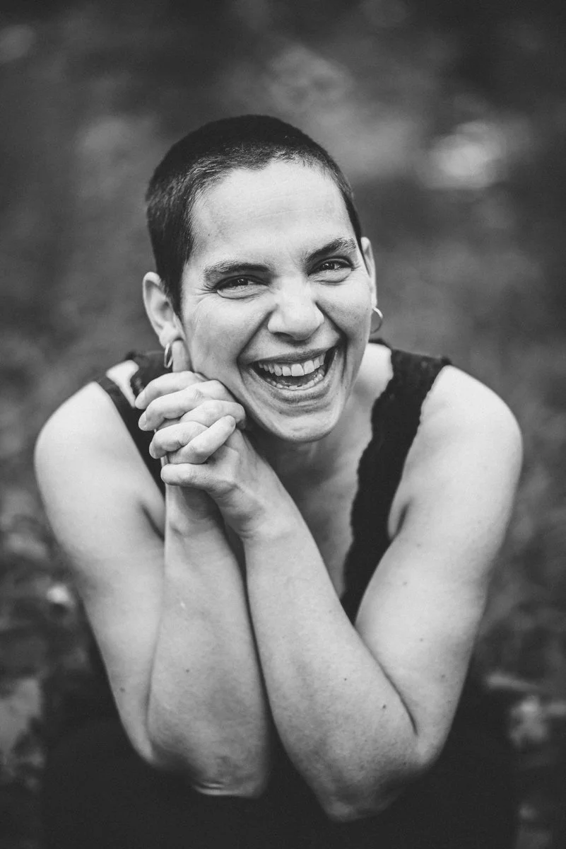 Woman laughing in black and white portrait