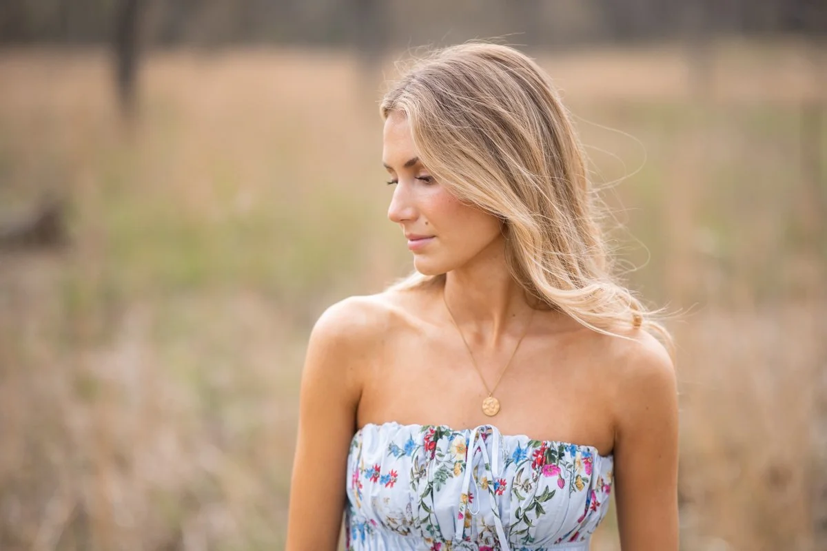 portrait of a woman in a spring field in Chicago