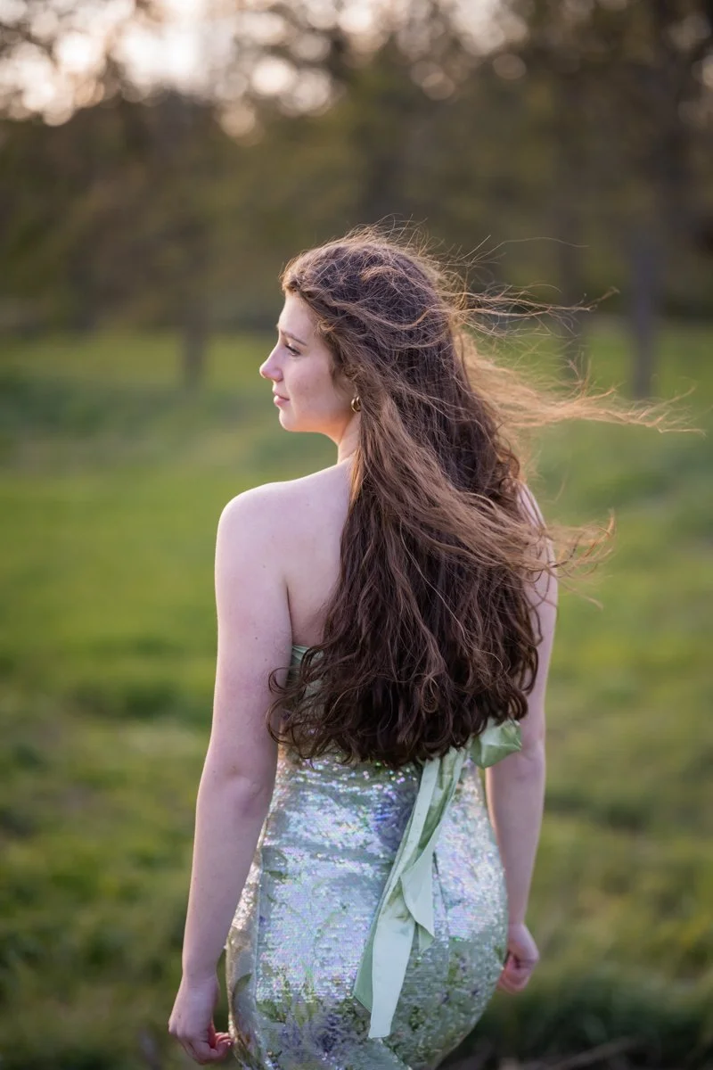 windswept hair portrait of a teen in a field in Chicago
