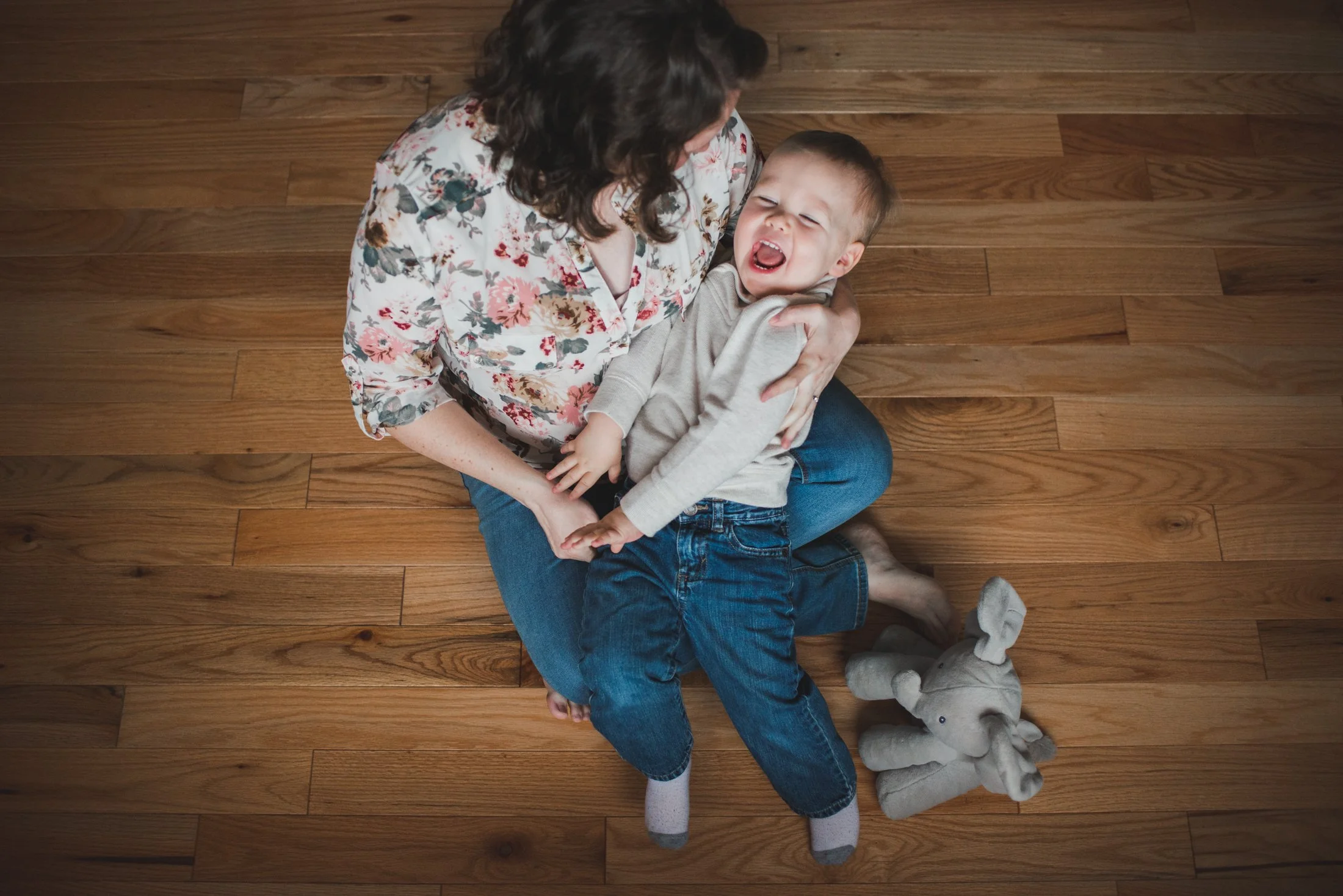 Playful moment of motherhood captured in photography