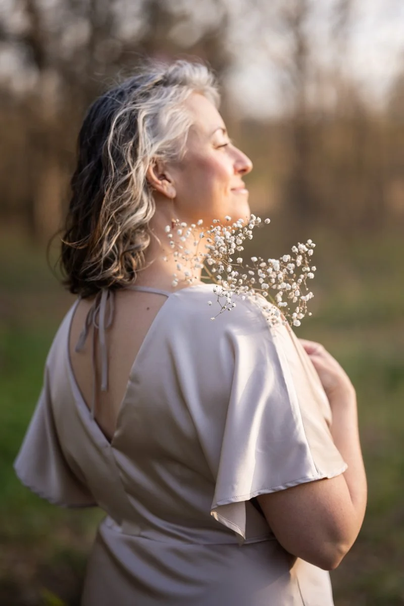 woman with silver hair in a portrait in Chicago in spring