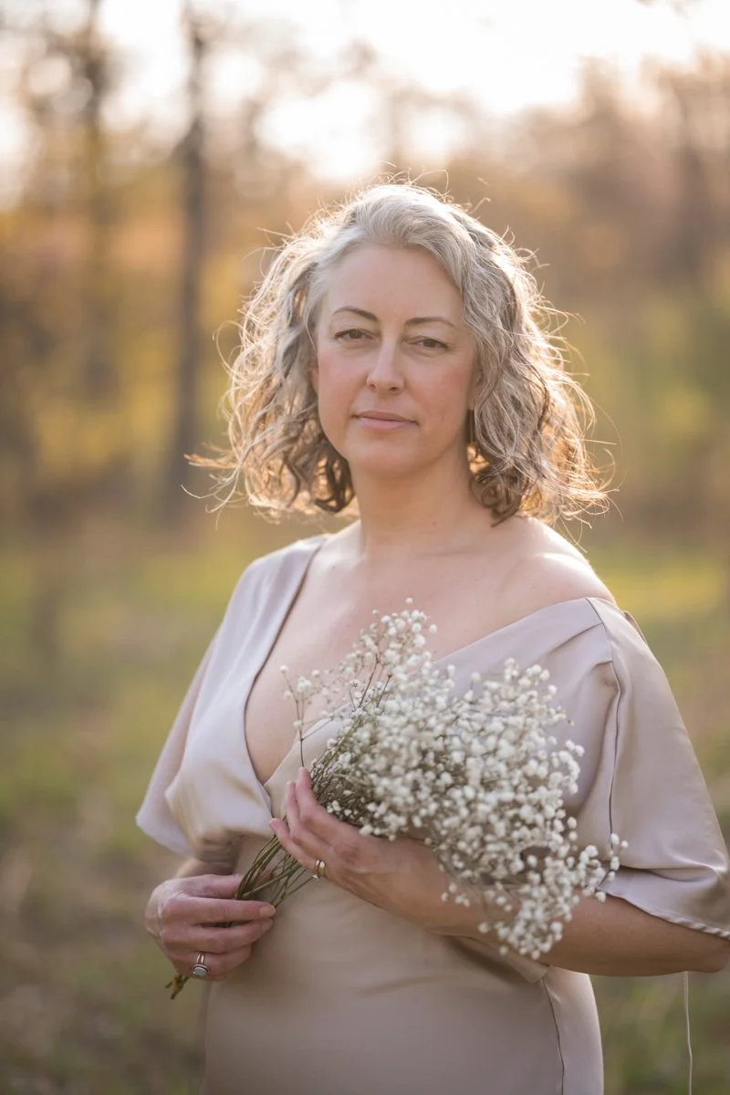 woman in middle age in a portrait in a romantic satin dress in Chicago