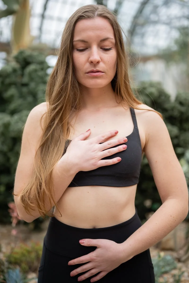 woman holding a serene yoga post in a portrait