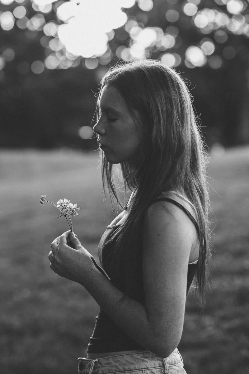 black and white profile portrait of a teen