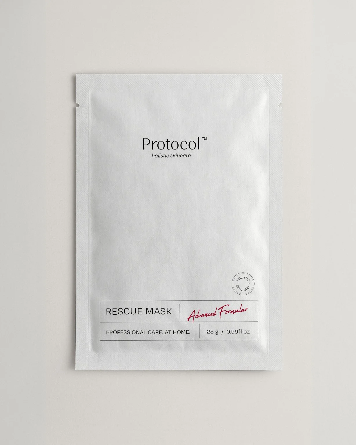A white package of a skincare product labeled 'Protocol', with text indicating it is a 'Rescue Mask' with an advanced formula, for professional care at home, weighing 28 grams or 0.99 fluid ounces.