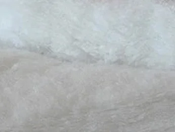 Recycled insulation panels stacked for installation in a compact tiny home.