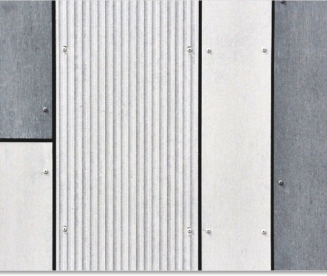 Fibre cement façade panels installed on a minimalist tiny home.