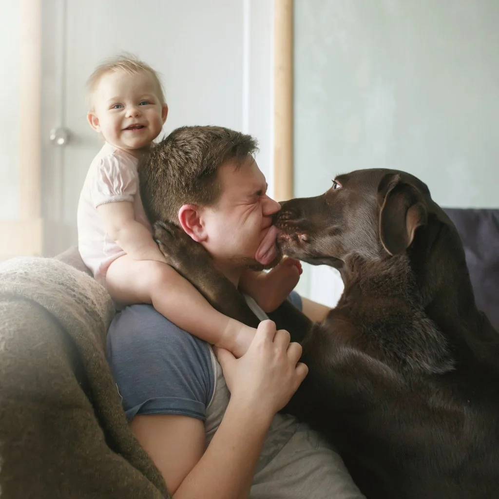 Maine father and child with loving dog