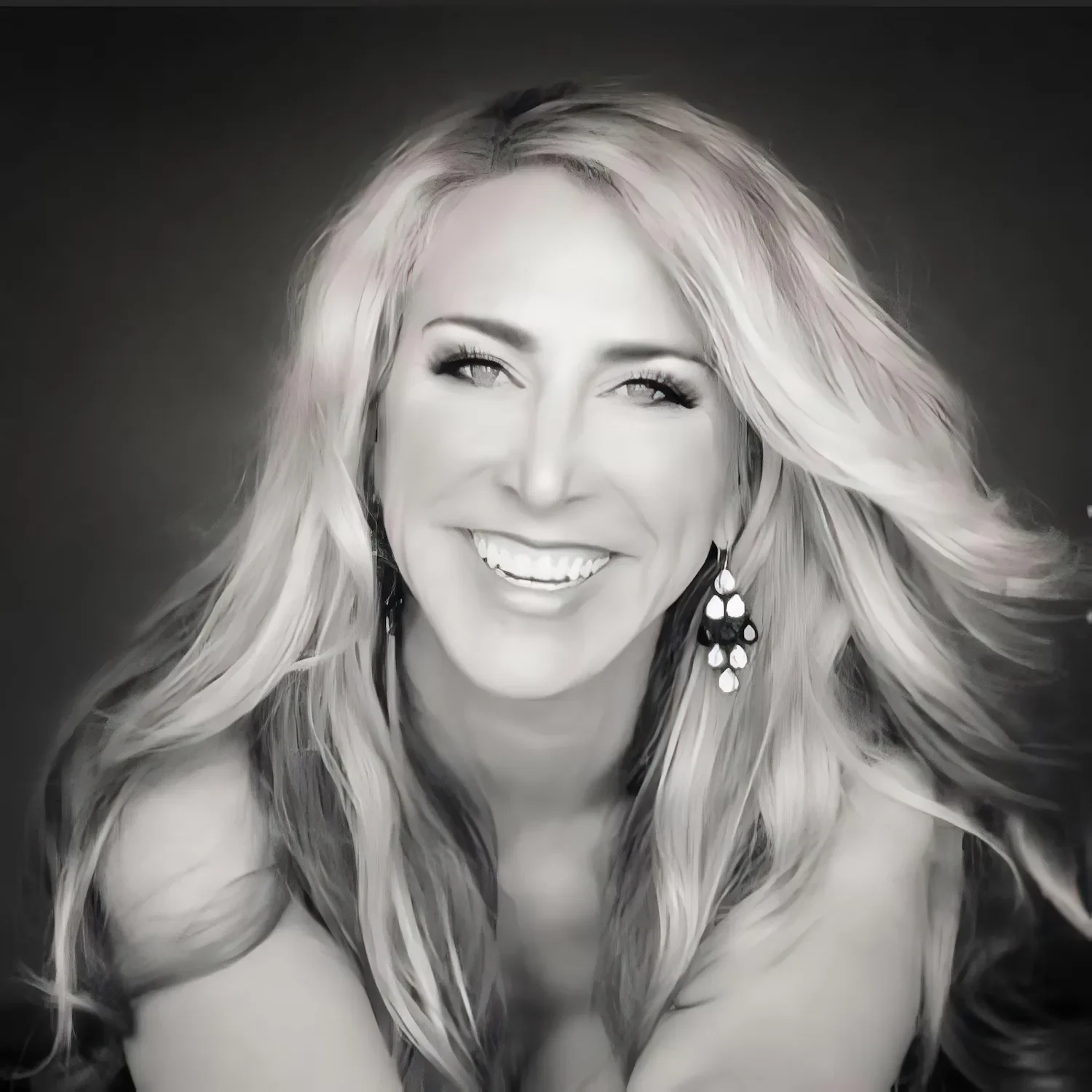 Black and white close-up portrait of Lisa Fierer smiling.