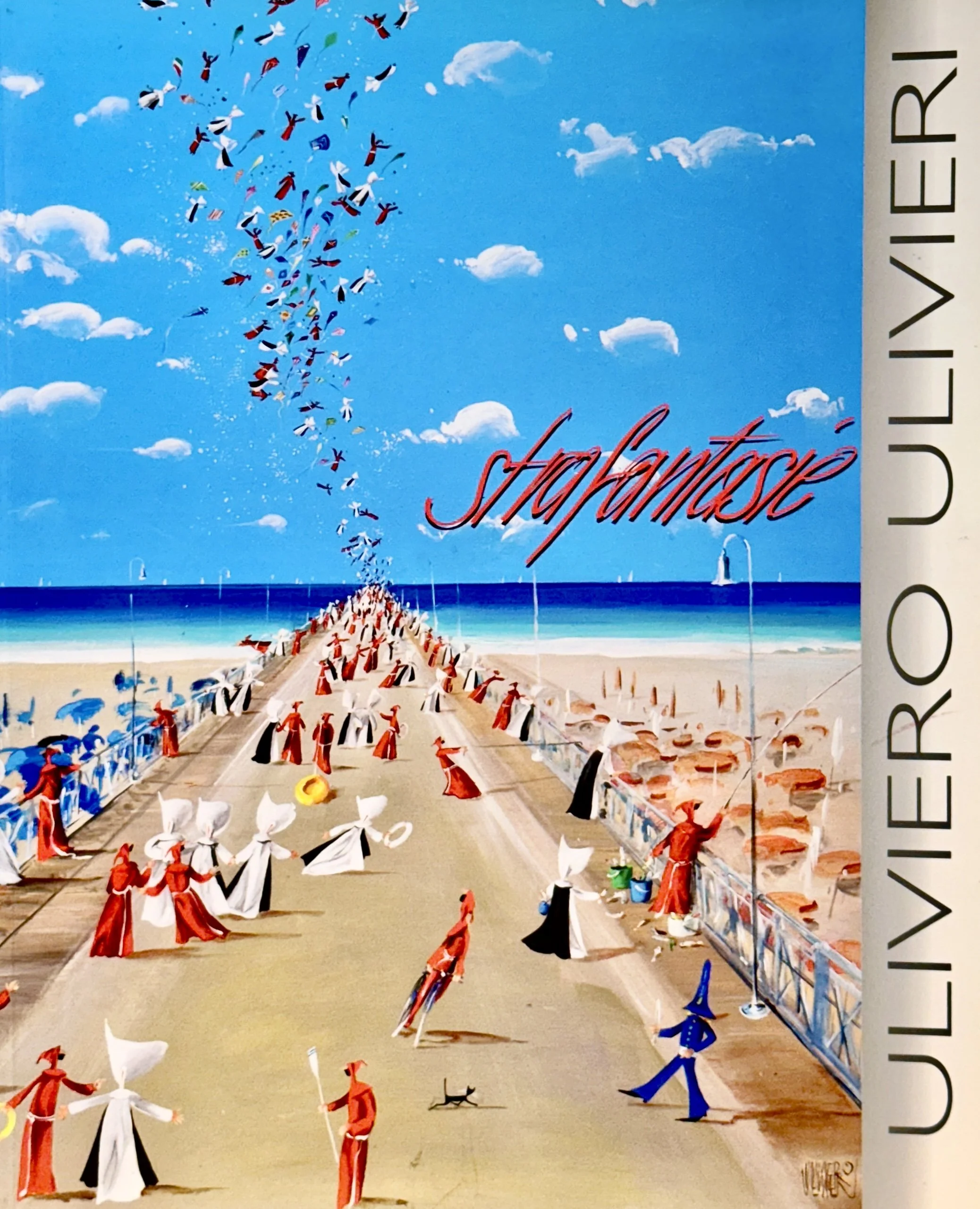 A colorful illustration of a pier extending into the ocean. Figures dressed as Santa Claus and a wizard are walking along, with some holding umbrellas, bags, and other items. The sky is bright blue with clouds, and seagulls are flying above. The words 'stapleton' and 'VIEUTI' appear on the image, indicating titles or names.