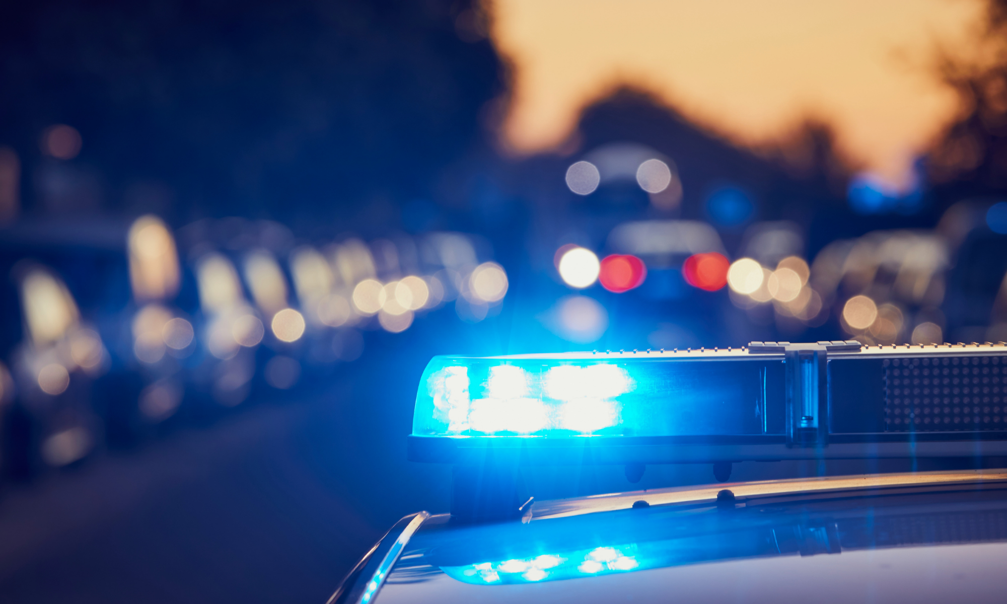 car accident scene in Phoenix with police presence that might require an accident report