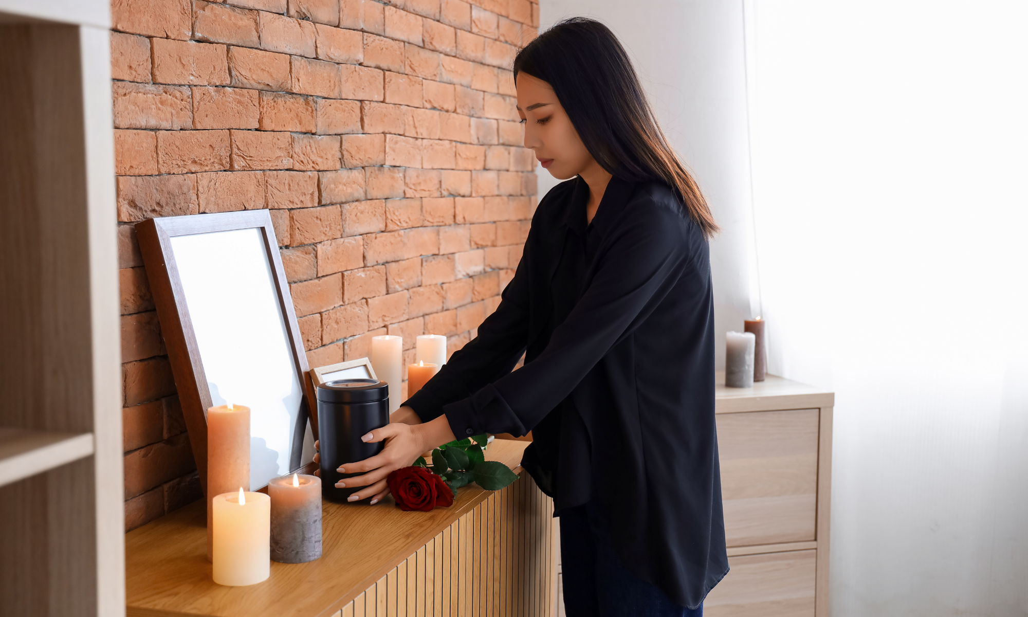 Grieving person with an urn after fatal car accident
