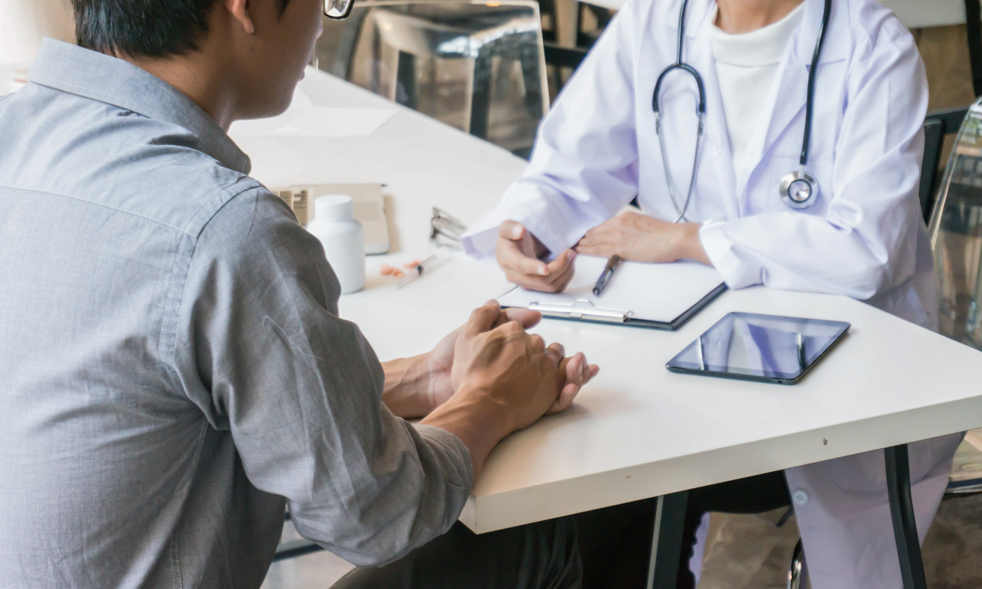 Arizona driver reviewing insurance claim paperwork after accident