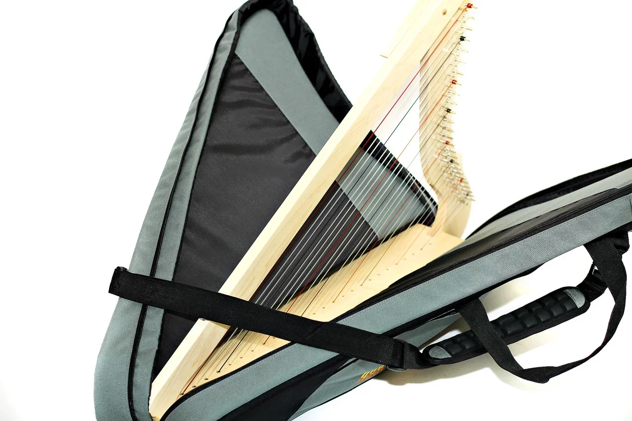 Rees+Harps+Green+Bag+Open+w+Harp+Horizontal+.webp