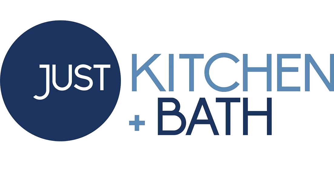 Logo with a dark blue circle containing white text 'JUST' and adjacent text 'KITCHEN + BATH' in different shades of blue.