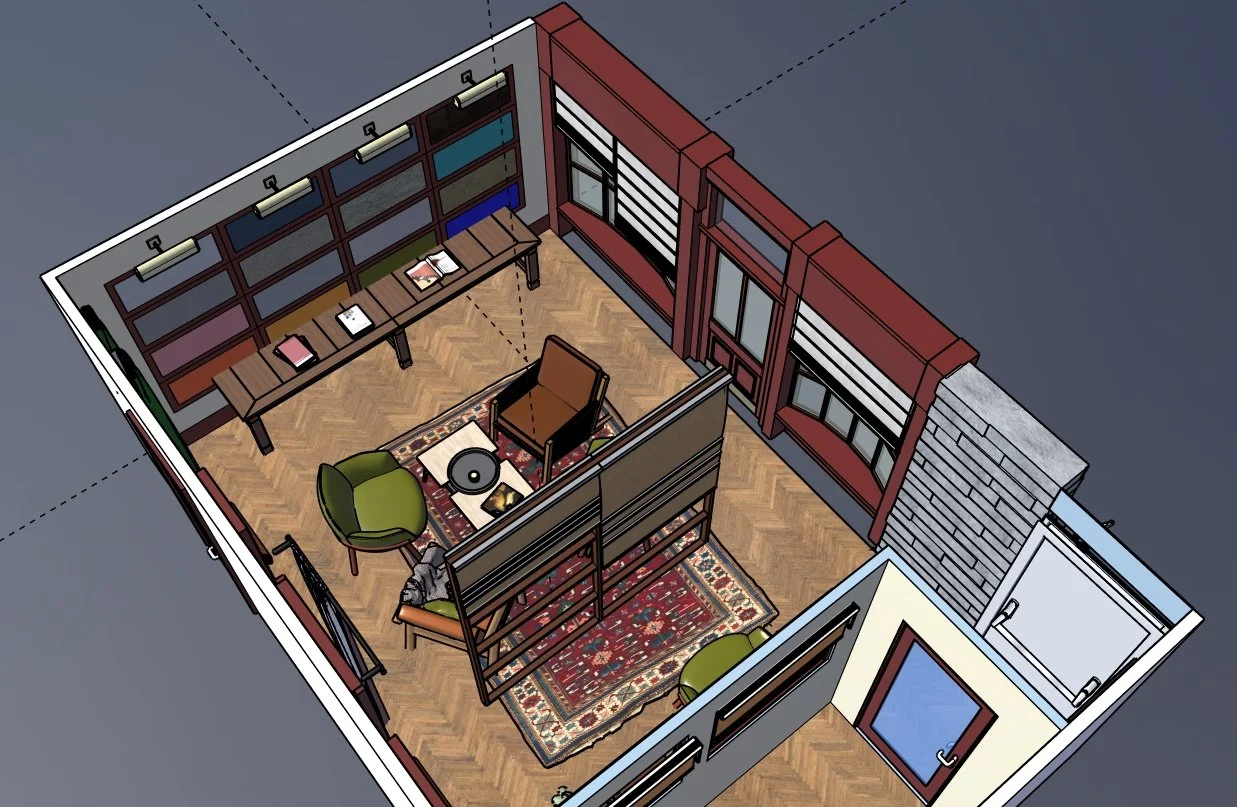 A 3D rendered interior of a small room with wooden flooring, featuring a bookshelf along one wall, a small desk with papers, two green chairs, a larger armchair, a patterned rug, and multiple windows and a door.