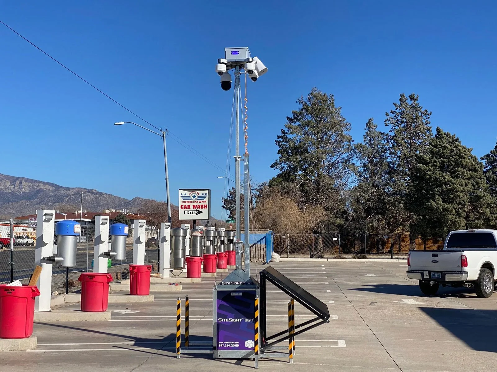 SiteSight camera tower in parking lot.