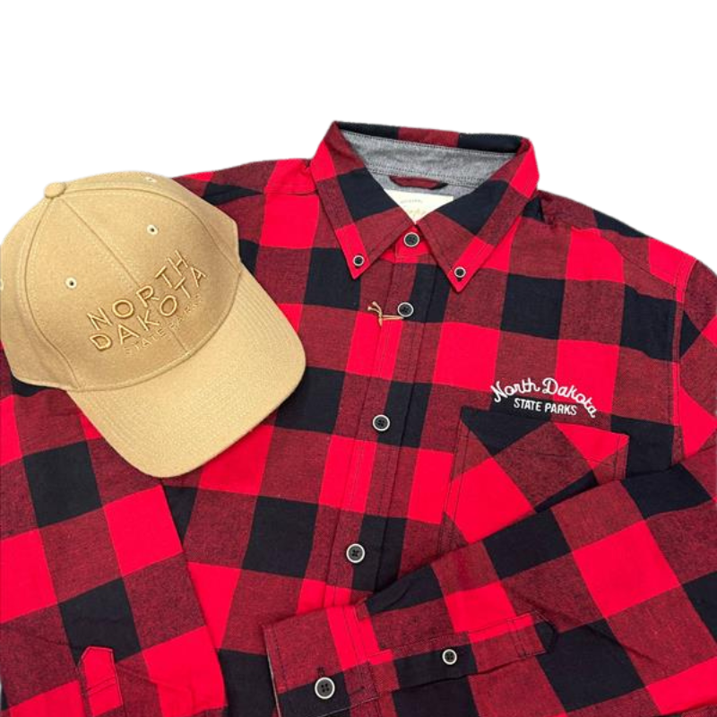 Close up of red plaid flannel and tan hat bundle