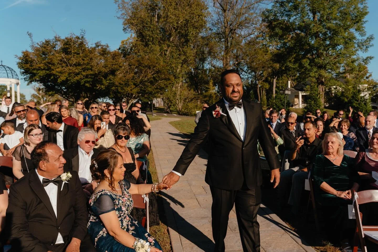 Ceremony tips from a wedding photographer:

1. Slow down (seriously, slower than you think)
Most people rush because of nerves. A slower pace looks more elegant in photos and gives your photographer time to capture multiple moments.

2. Good posture 