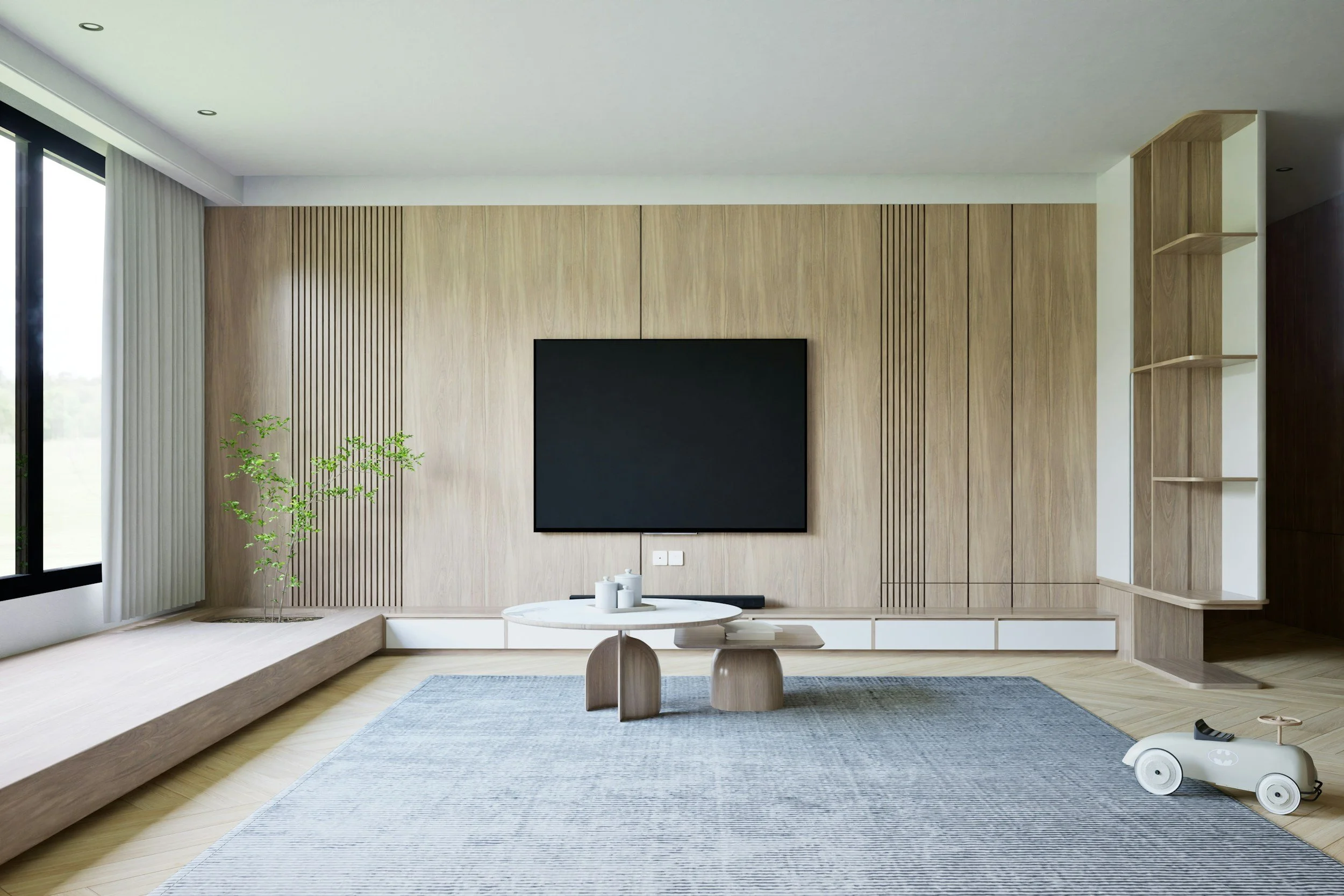 Modern living room with wooden wall paneling, a large flat-screen TV, a round coffee table, a potted plant, and a white toy car on a light-colored rug.
