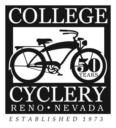 Logo of College Cyclery in Reno, Nevada, celebrating 50 years since its establishment in 1973, featuring a black and white bicycle graphic and bold text.