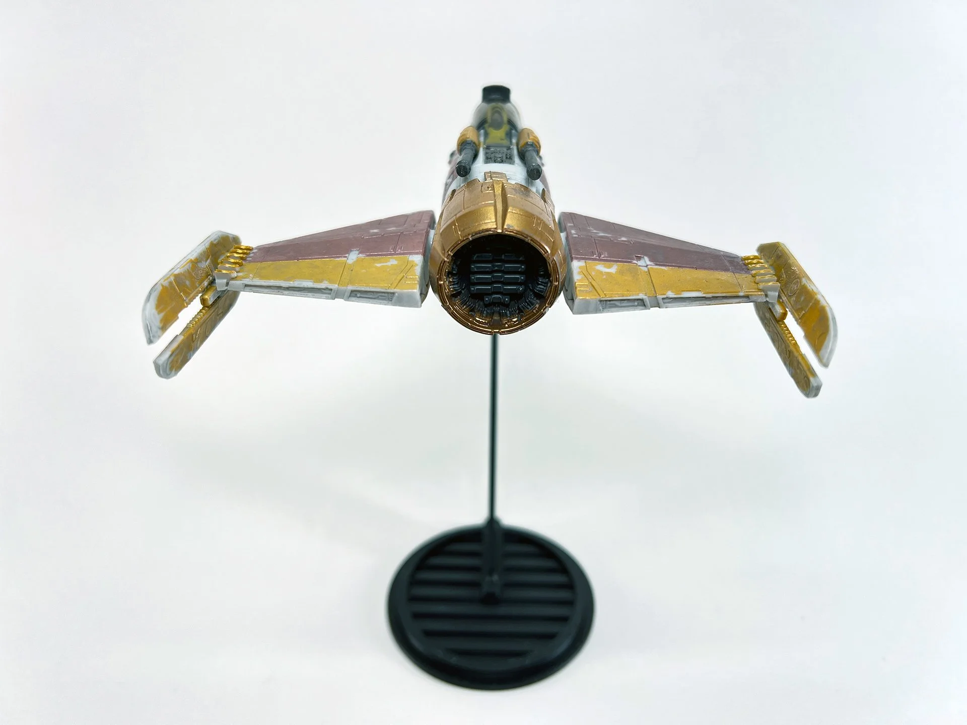 Fiend Fighter Flight Stand (Closed Wings), part of the Micro Galaxy Squadron series, presented on a sleek black stand against a plain background, ideal for Star Wars merchandise displays.