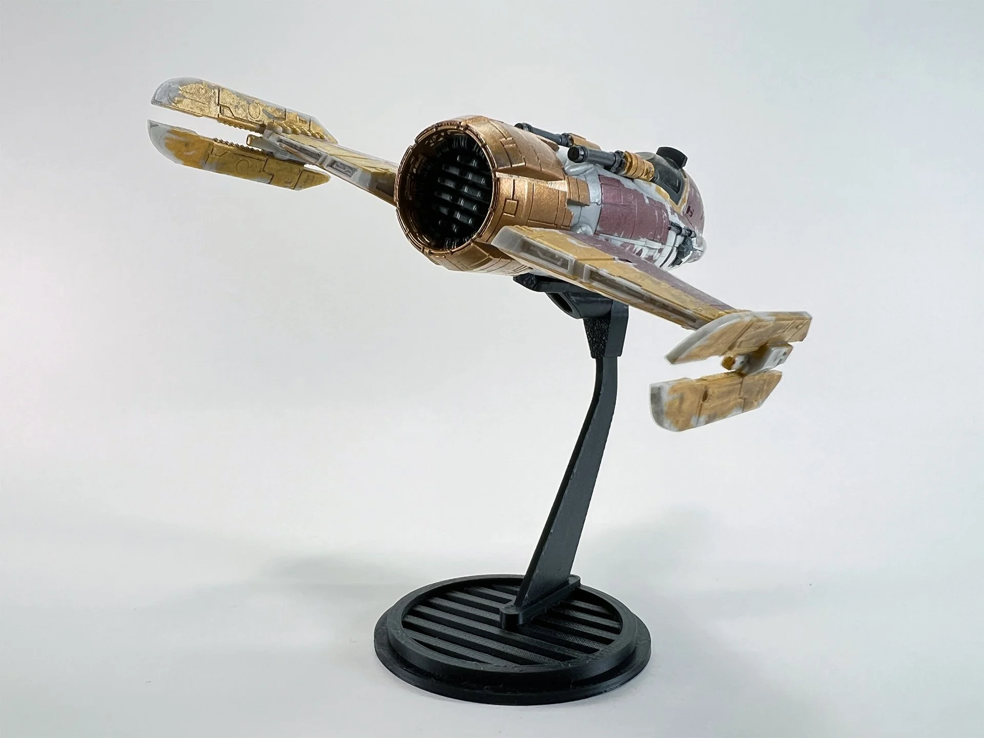 Fiend Fighter from the Micro Galaxy Squadron series, positioned on a modern black stand with a plain background, perfect for Star Wars collectors and enthusiasts.