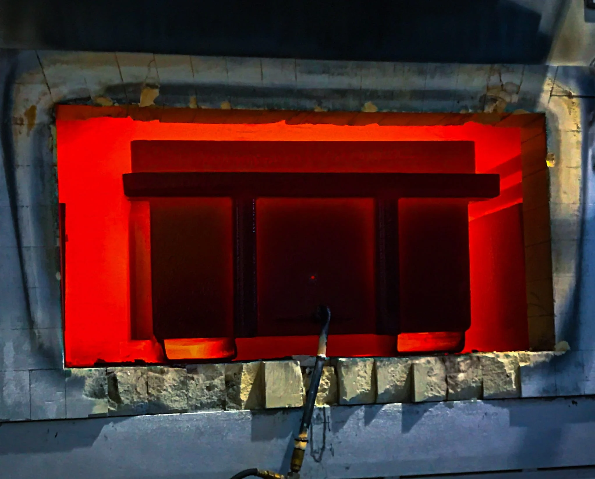 Boronizing oven that is on and actively boronizing parts in the shop located in Leduc, Alberta, Canada.