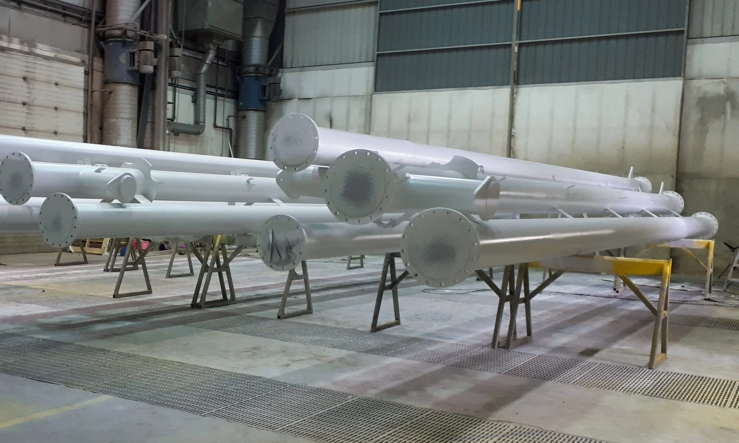 Multiple large pipelines and spools with protective industrial coating in Edmonton, Alberta