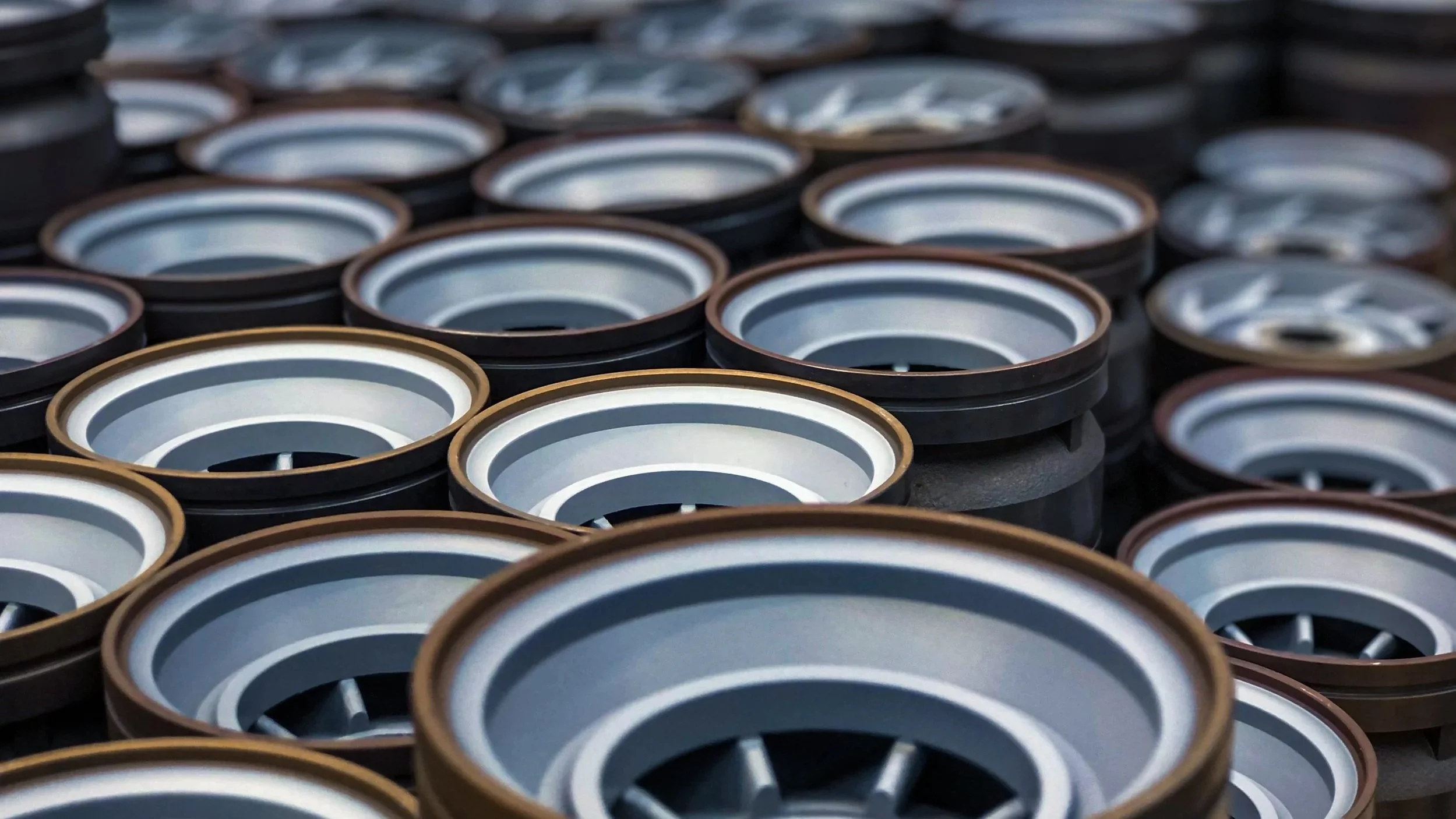 Rows of Teflon coated downhole components.